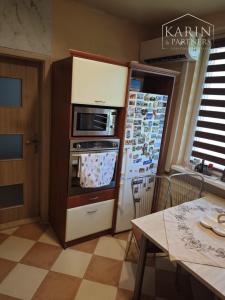 Výhodná ponuka: Na predaj – Priestranný 4-izbový byt po rekonštrukcii so špajzou a balkónom na sídlisku JUH – Nové Zámky