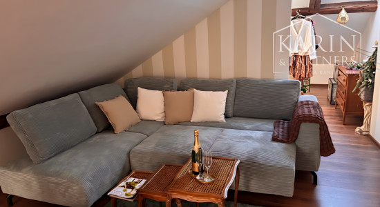 Bývanie s príbehom: Priestranný podkrovný byt v historickom dome Vincentiek