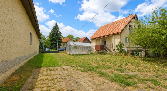 Rodinný dom s garážou a romantickým posedením pri rieke Krupinica (Zvolenská cesta, Krupina)